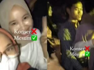Aksi mesum dilakukan oleh sepasang kekasih yang tengah berada di tengah-tengah konser padat merayap